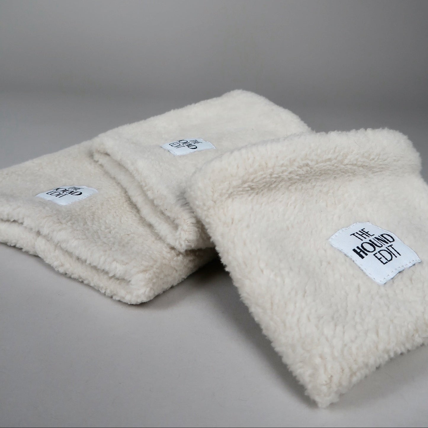 Close-up of The Rue, Sighthound 100% cotton snoods, across the three sizes.