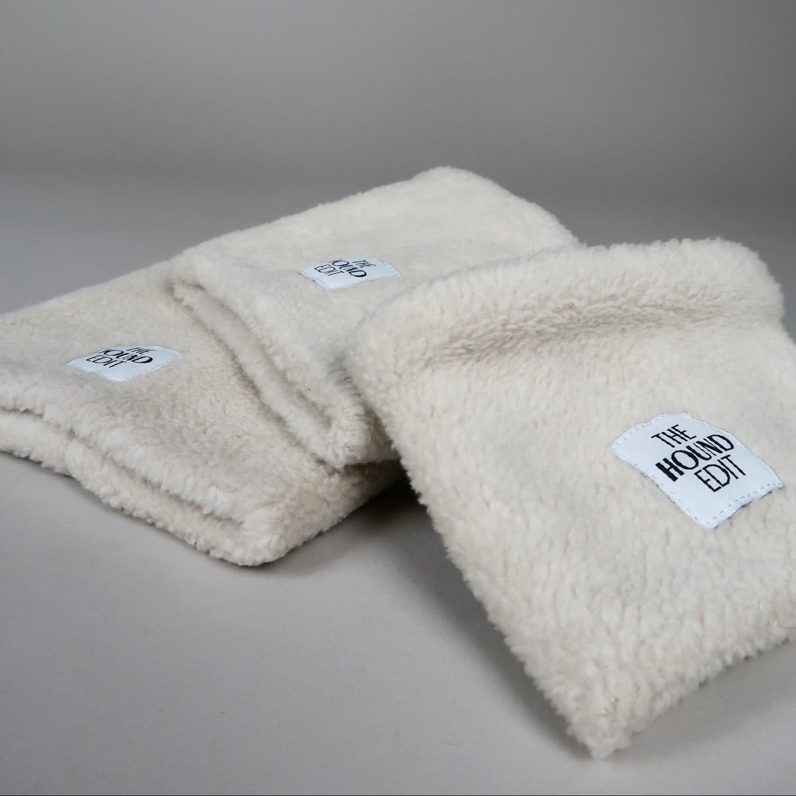 Close-up of The Rue, Sighthound 100% cotton snoods, across the three sizes.