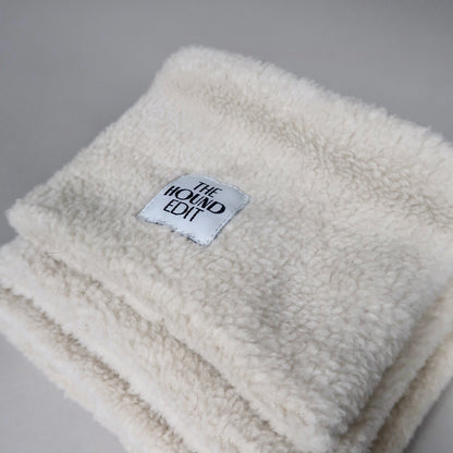 Stacked close-up from above of The Rue, Sighthound 100% cotton snoods, across the three sizes.